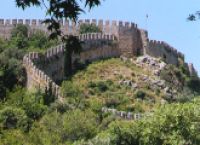 Následující den jsem si to zopakoval bez lodě. Při pohledu z Poseidonovy říše na korunu hradeb jako bych se propadl o dva a půl tisíce let nazpět.